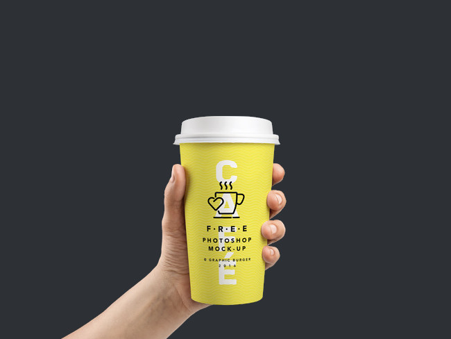 Photorealistic Coffee Cup In Hand PSD MockUp 
