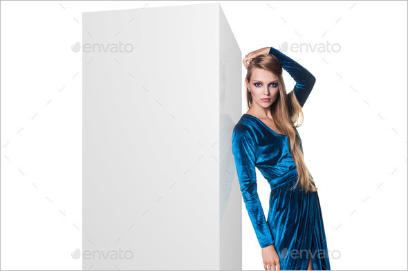 Fashion model leaned on white blank box picture