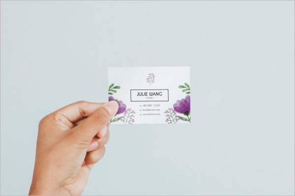 Hand Holding Business Card's Mockup