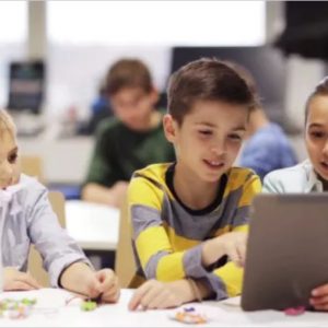 Kids with Tablet Pc Programming at Robotics School