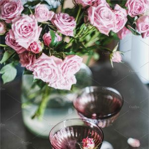 Champagne in Glasses and Pink Roses